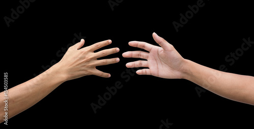 couple of helping/praying hand while background,support/ aid/love/trust / healthcare/ therapy/healing /affection / friends and family concept.