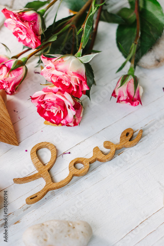 wooden word LOVE with the r...