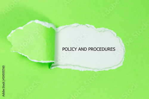Policy And Procedures message written under torn paper.