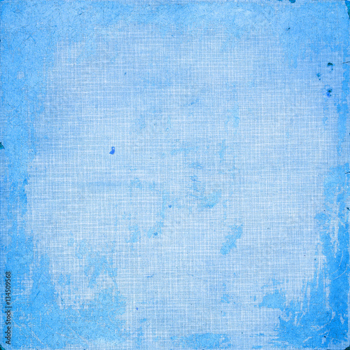 Blue grunge textured background with grid pattern