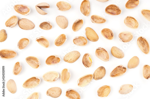 Pistachio shells on white background