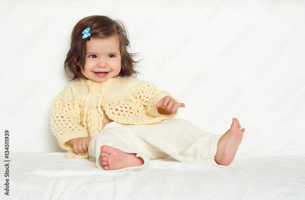 happy little child girl sit on white towel, happy emotion and face expression happy little child girl sit on white towel, happy emotion and face expression