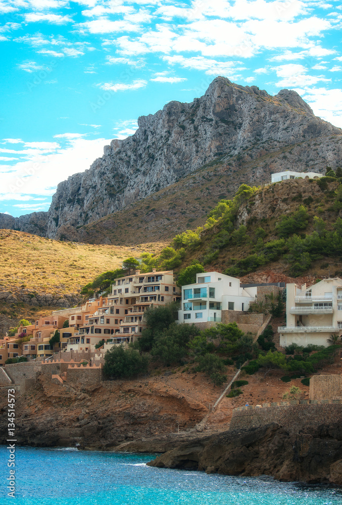 Houses in mountain hills near the sea.