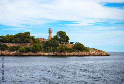 Obraz na płótnie Historical lighthouse in Port de Pollenca. w salonie