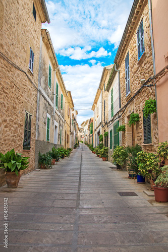 Fototapeta Naklejka Na Ścianę i Meble -  Beautiful narrow old street in mediterranean city.