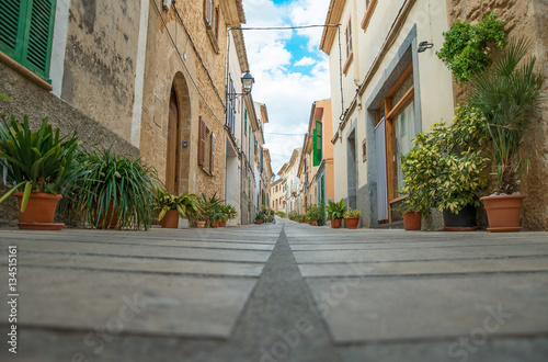 Fototapeta Naklejka Na Ścianę i Meble -  Beautiful narrow old street in mediterranean city.