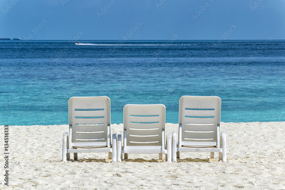 Three beach chairs
