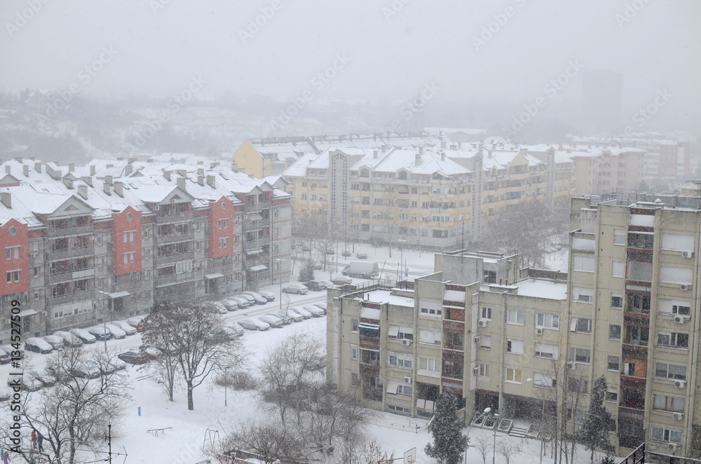 Block of residential buildings on a snowy day