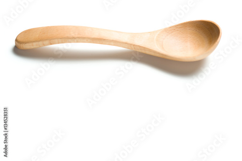 A wooden spoon isolated over white background