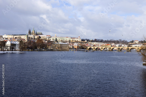 Snowy freeze Prague Lesser Town with gothic Castle and Charles Bridge, Czech republic © Kajano