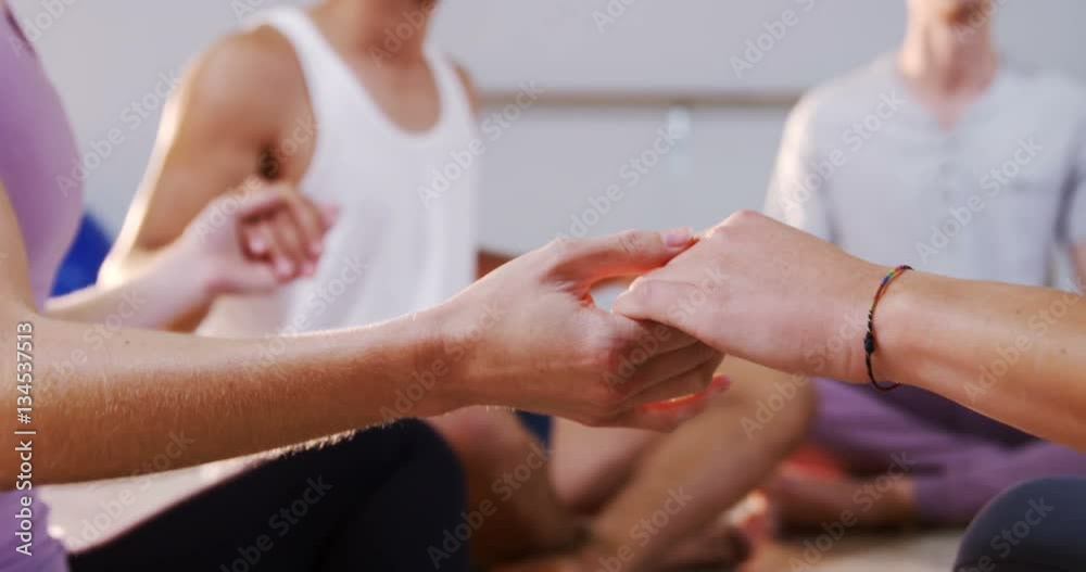 Group of people performing yoga in fitness studio 4k Group of people performing yoga in fitness studio 4k