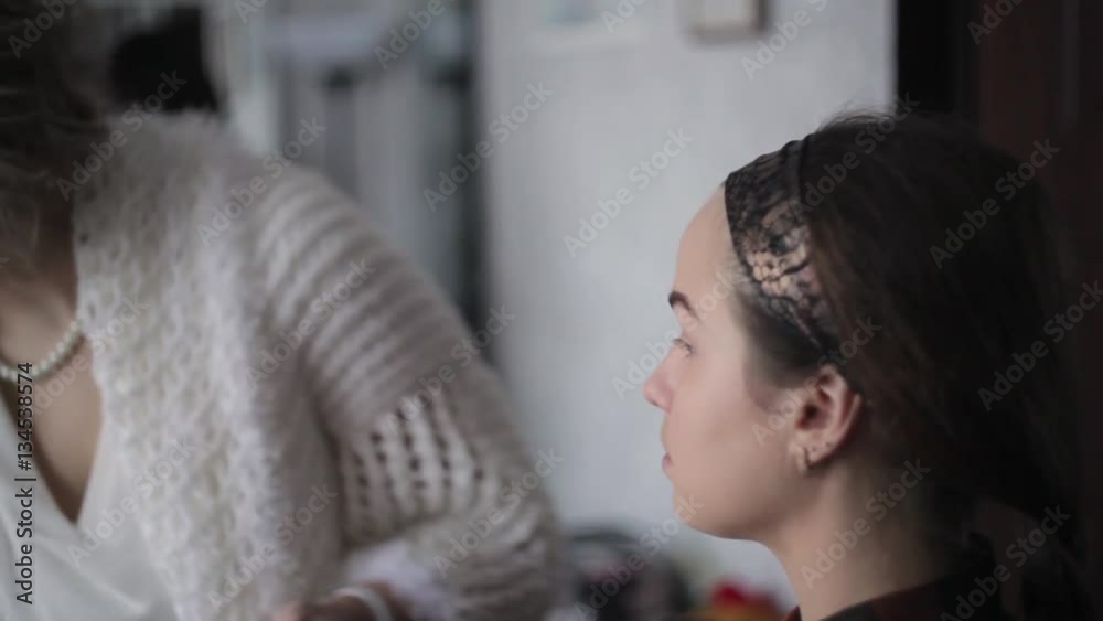 make-up artist working with model make-up artist working with model