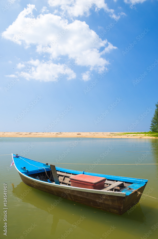 Boat at beach and blue sky