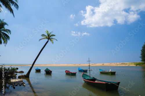Boat at beach and blue sky © sujadn