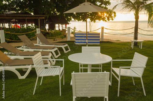 Beach Chairs and Umbrella , Thailand © sujadn