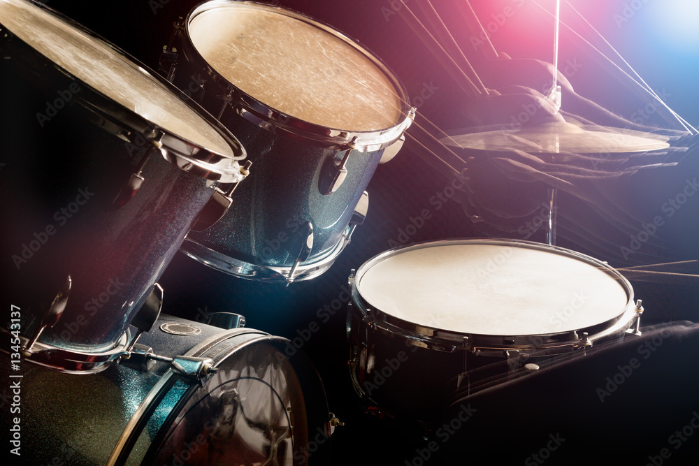 The man is playing drumset The man is playing drumset
