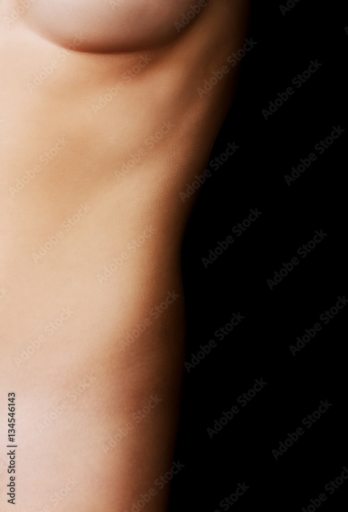 Naklejka premium Ciało młodej kobiety nago