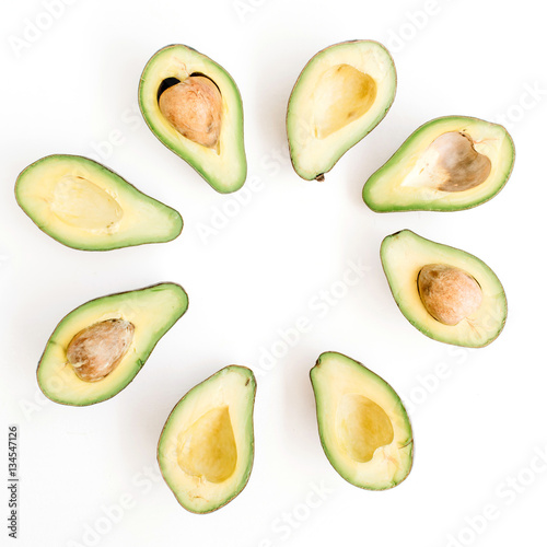 Sliced raw avocado arrangement. Flat lay, top view. Creative food concept