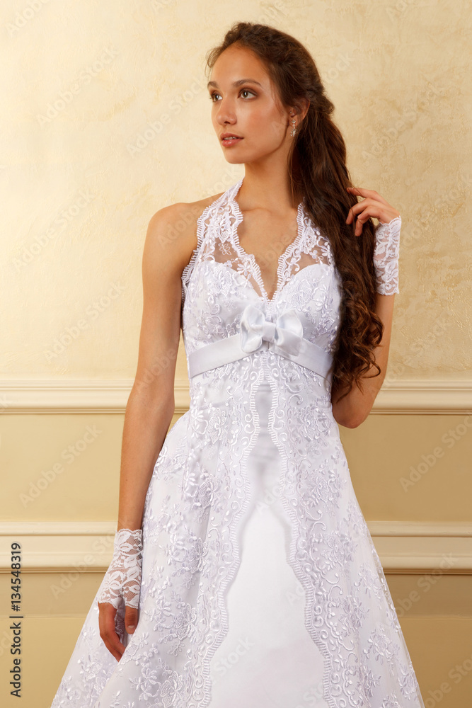 Classical young gorgeous bride with long brown hair. Studio shoot Classical young gorgeous bride with long brown hair. Studio shoot