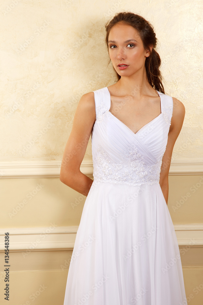 Classical young gorgeous bride with long brown hair. Studio shoot Classical young gorgeous bride with long brown hair. Studio shoot