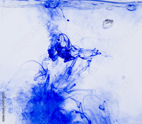 Abstract image of ink flowing in water to make an interesting and unique image.
