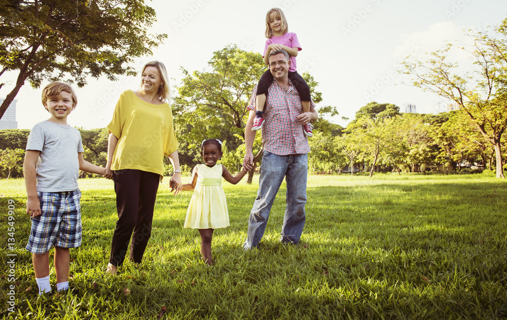 Fototapeta premium Family Walking Field Nature Togetherness Concept