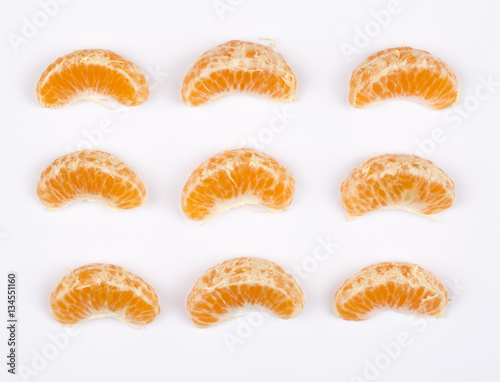 Top view of peeled mandarin isolated on white background.