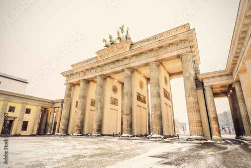 Brandenburg gate (Brandenburger Tor) in snow, Berlin, Germany, Europe, Vintage filtered style