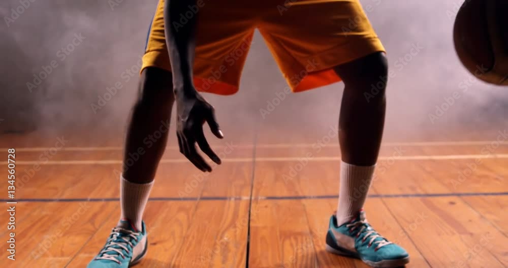 Sportsman playing basketball in basketball court 4k