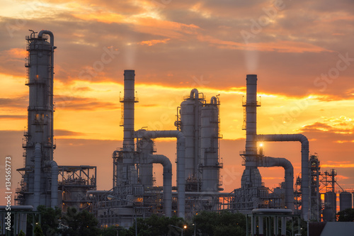 chemical plant and oil refinery industry with sunrise
