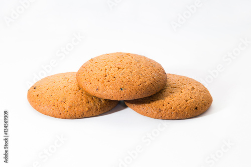 Oat cookies. Closeup of delicious oat cookies on white background.