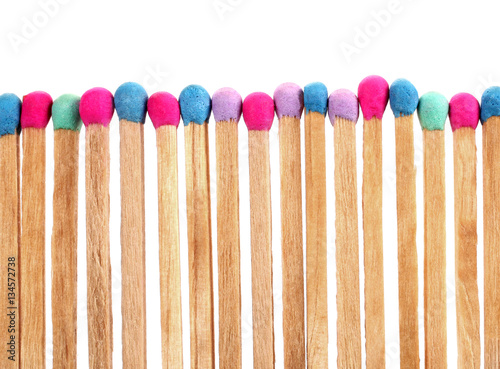 Colorful matches perfectly sharpened placed in level row