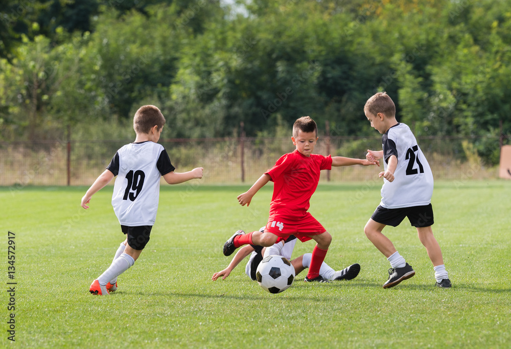  Boys kicking ball