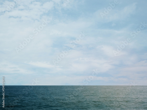 Blue sea/ocean and clouds sky abstract background in Thailand. horizon over view. summer relaxing time. © sky1991