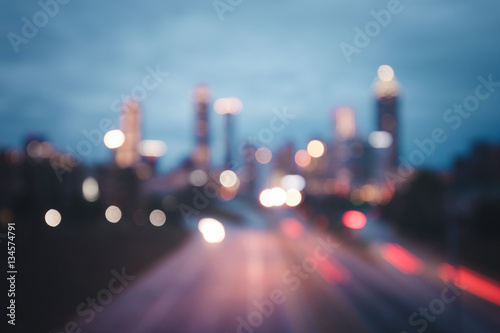 Fotografia Bokeh lights of modern city night skyline