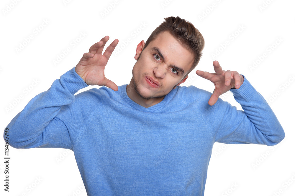 young man making facial expression young man making facial expression