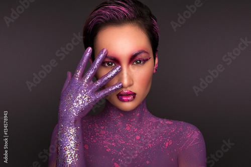 Fantasy violet make up, beautiful asian model, woman portrait