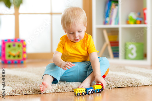 child boy playing with toys...