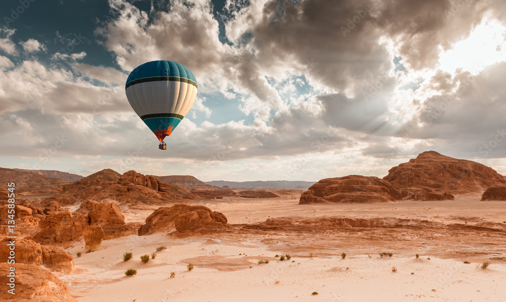 Hot Air Balloon travel over desert