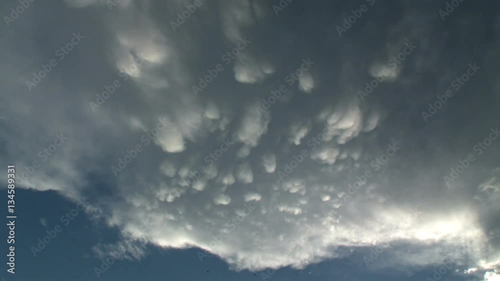 Mammatus Clouds Droop from Thunderstorm Anvil Cloud Mammatus Clouds Droop from Thunderstorm Anvil Cloud