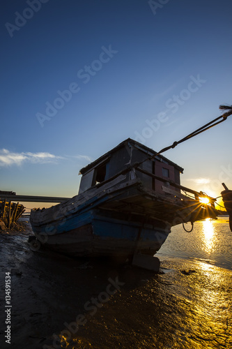 The river fishing boat in the evening