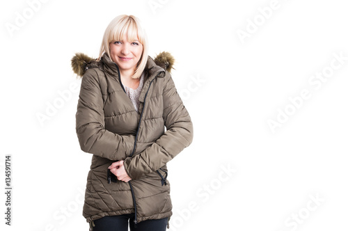 Beautiful female posing with warm winter and jacket