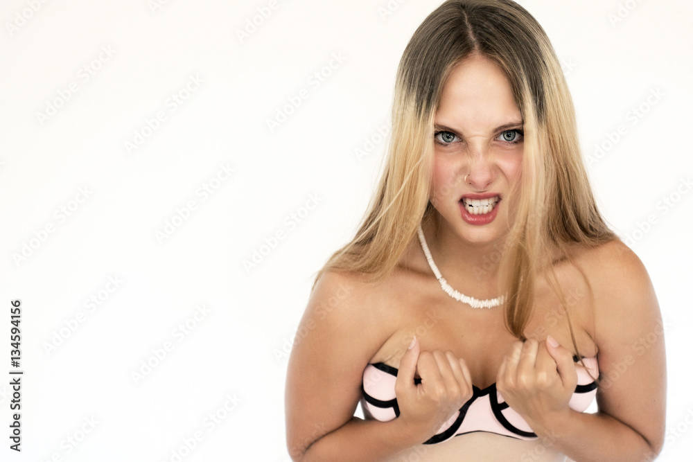Fototapeta premium Blonde girl with blue eyes in bikini and very angry 4764