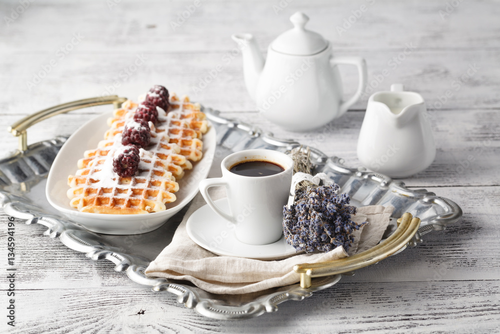 Brussels waffles with blackberries on plate Brussels waffles with blackberries on plate