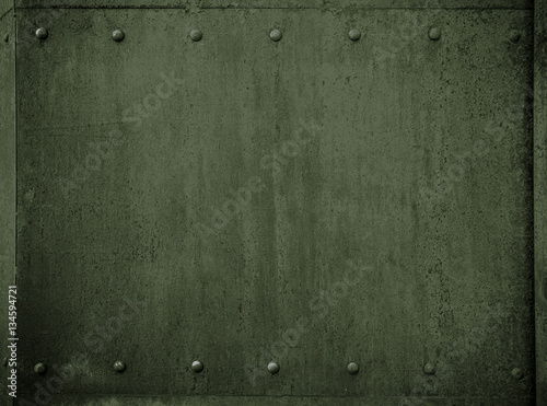 old military metal green armor background with rivets