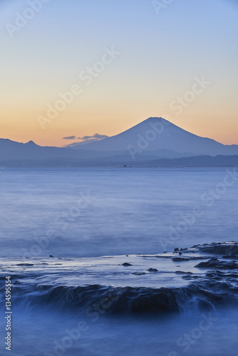 View of Mount Fuji and silky water after sunset from Enoshima, Kanagawa Prefecture, Japan