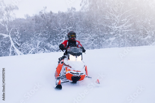 Winter Finnish snowy lanscape with road and snowmobile © magentael