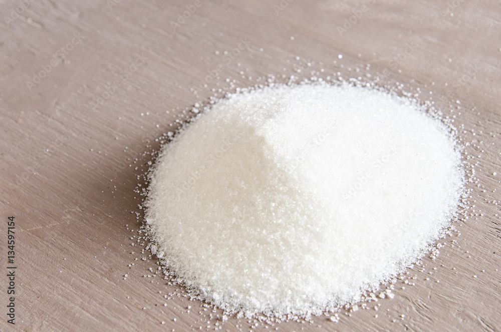 White sugar on the table in a kitchen White sugar on the table in a kitchen