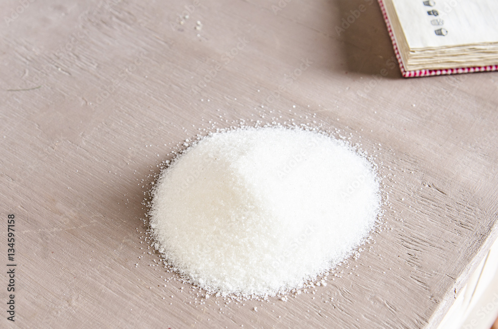 White sugar on the table in a kitchen White sugar on the table in a kitchen