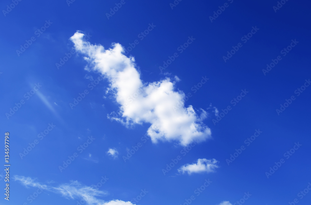 The blue sky with clouds, background.Blue sky background with tiny clouds The blue sky with clouds, background.Blue sky background with tiny clouds